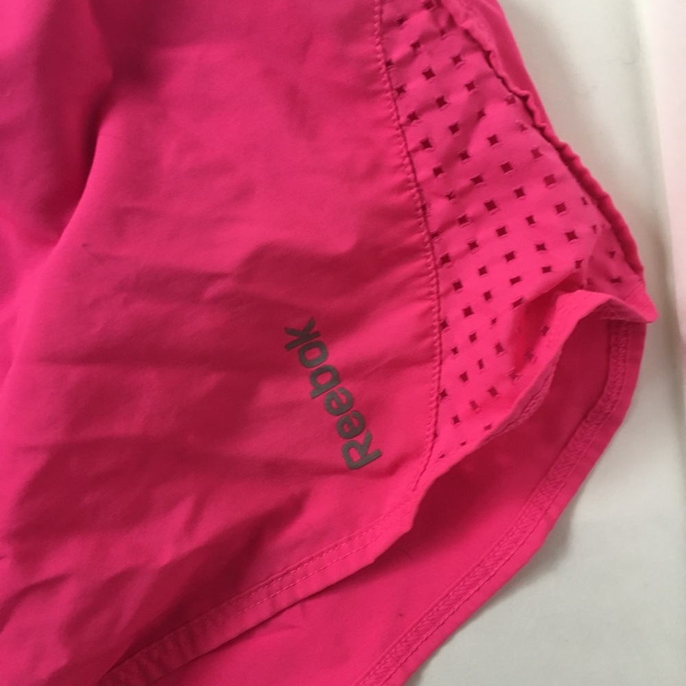 Pink running shorts
